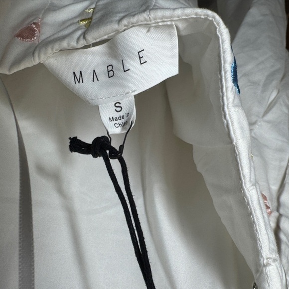 Chic White Backless Dress with Spaghetti Straps - Picture 10 of 13